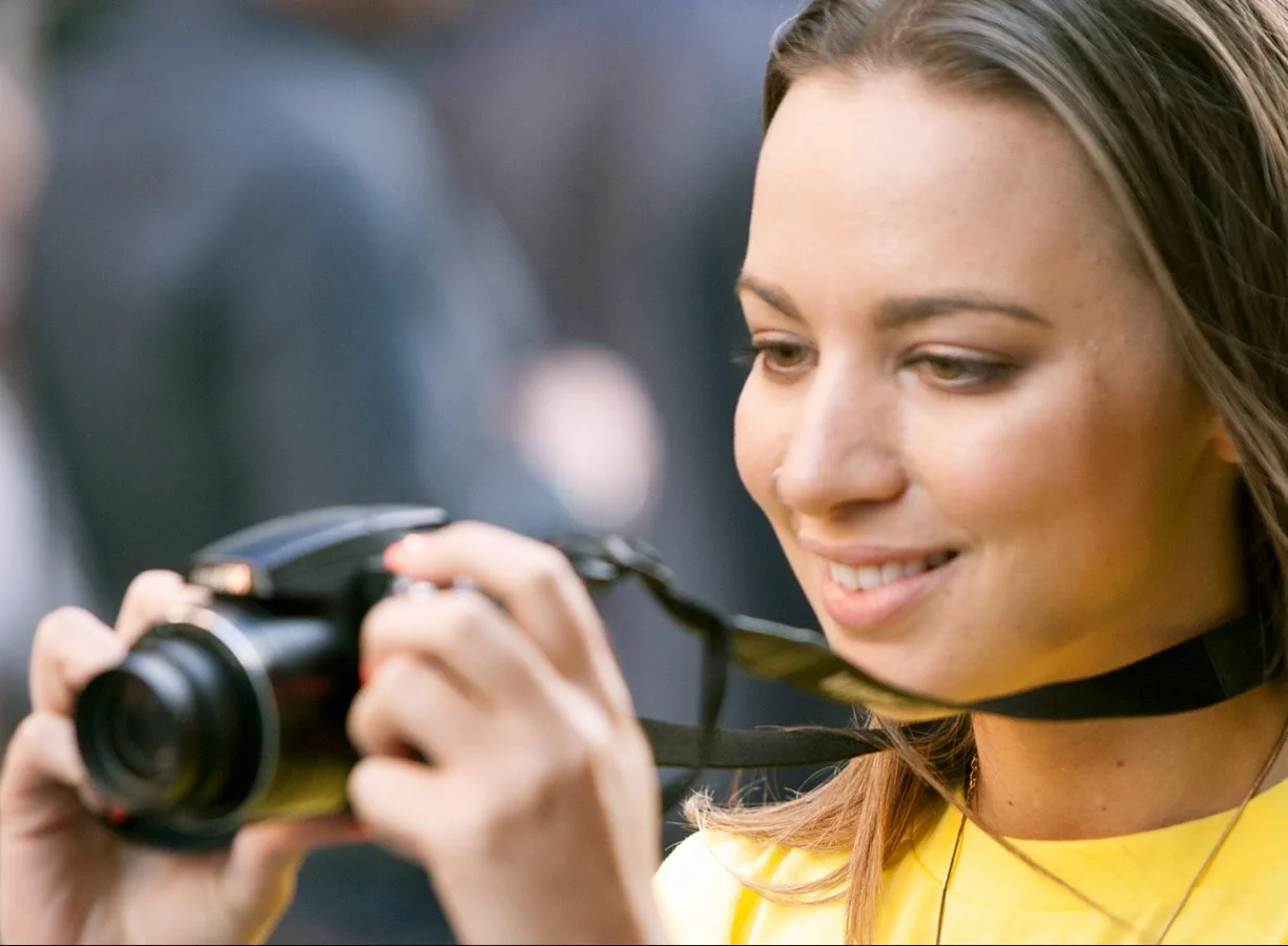 A girl taking a photograph