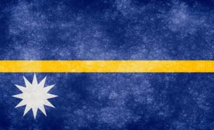 A textured graphic of the Nauru flag