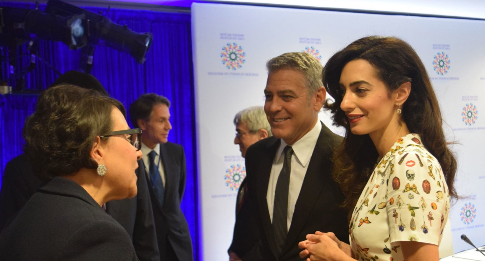 George and Amal Clooney at a Refugee Roundtable. © Flickr/US Dept. of Commerce