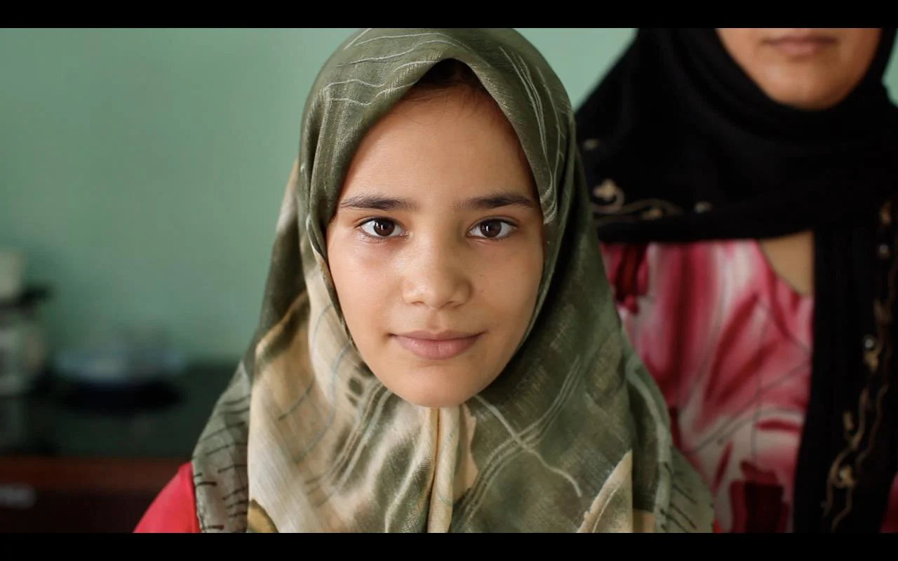 Still of a young Afghani girl feature in 'Between the Devil and the Deep Blue Sea'