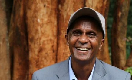 Eskinder Nega. smiling in front of the camera; Sarah Mwangi