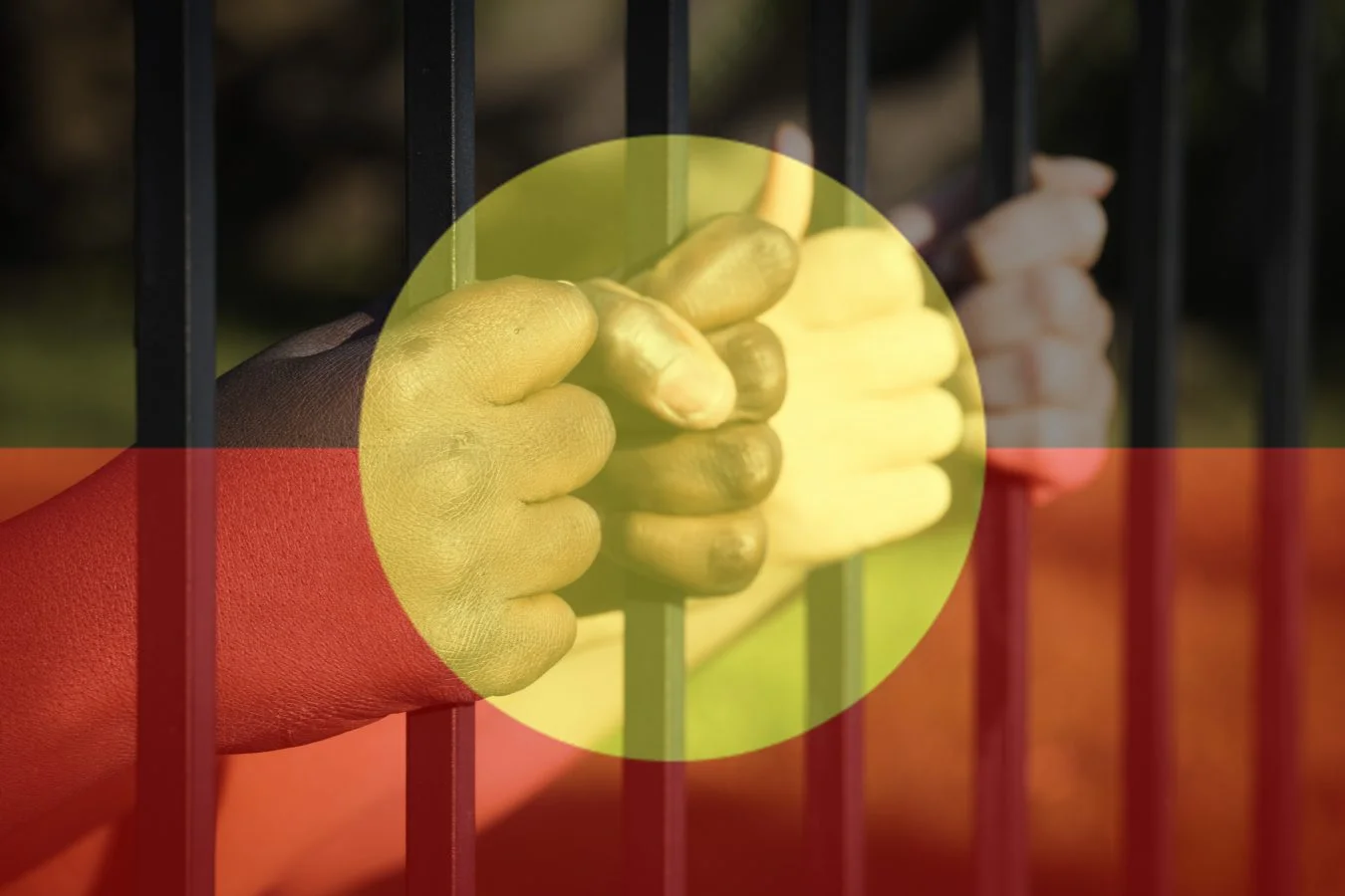 Children's hands with Indigenous Flag overlay