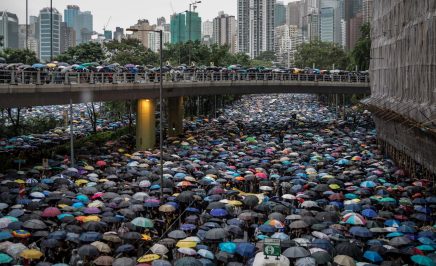 A sea of umbrellas stretching into the distance as thousands protest a proposed extradition bill that would allow people from Hong Kong to be extradited to China.