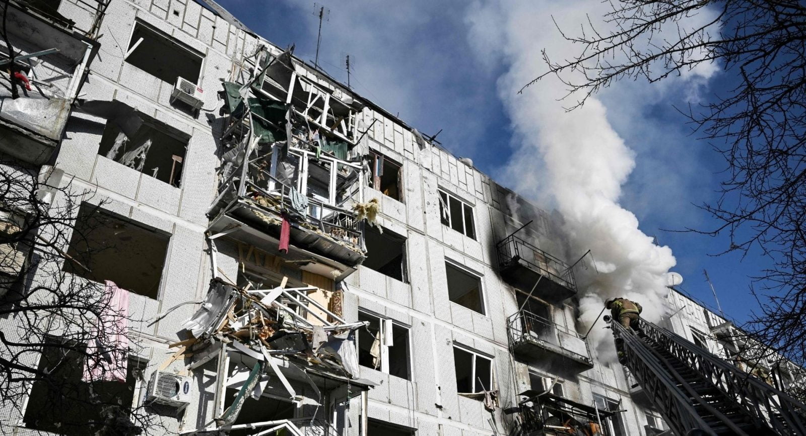 image of ukraine apartment building that has been destroyed by a missile