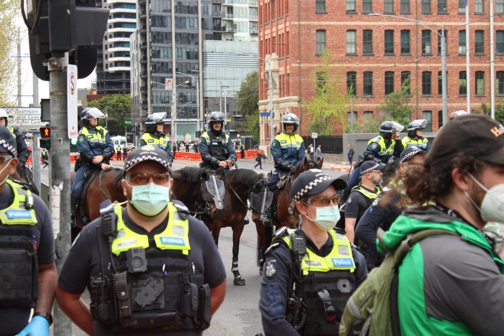 Police behind barricade